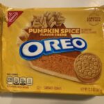 A container of Pumpkin Spice Oreos (mostly yellow packaging)